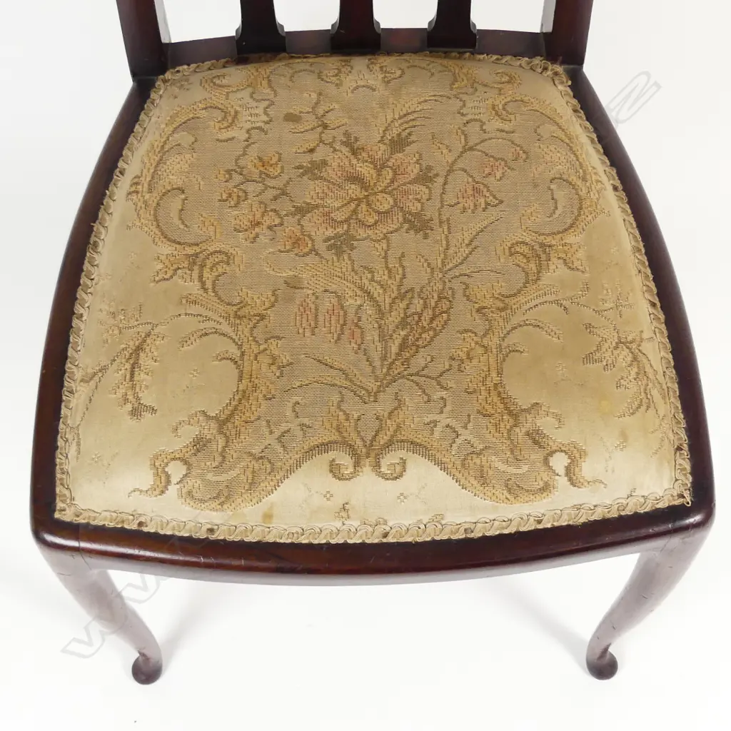 An Art Nouveau walnut salon chair Image 1++