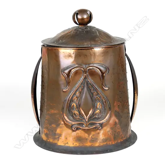 An Arts & Crafts copper coal bin