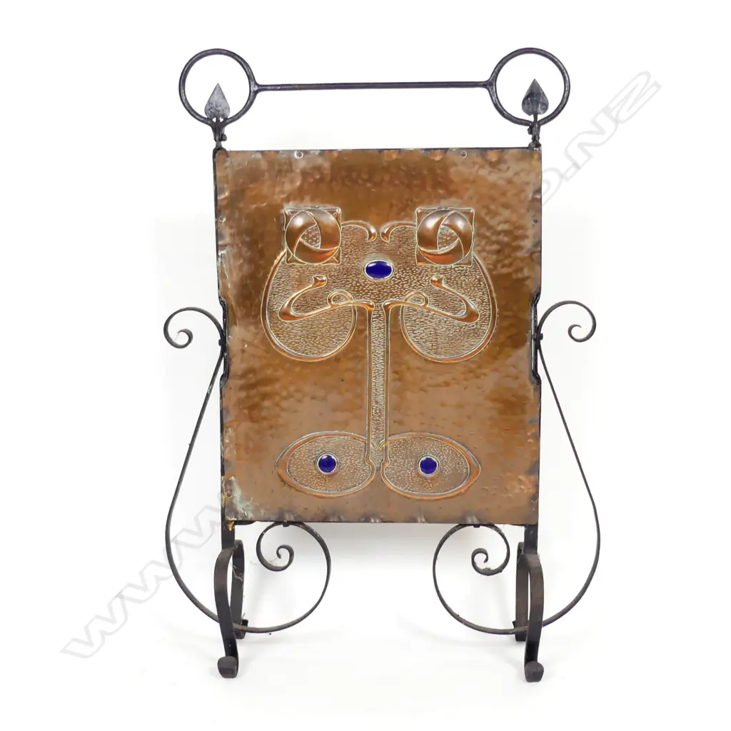An Arts & Crafts wrought iron and copper fire screen Image 1++