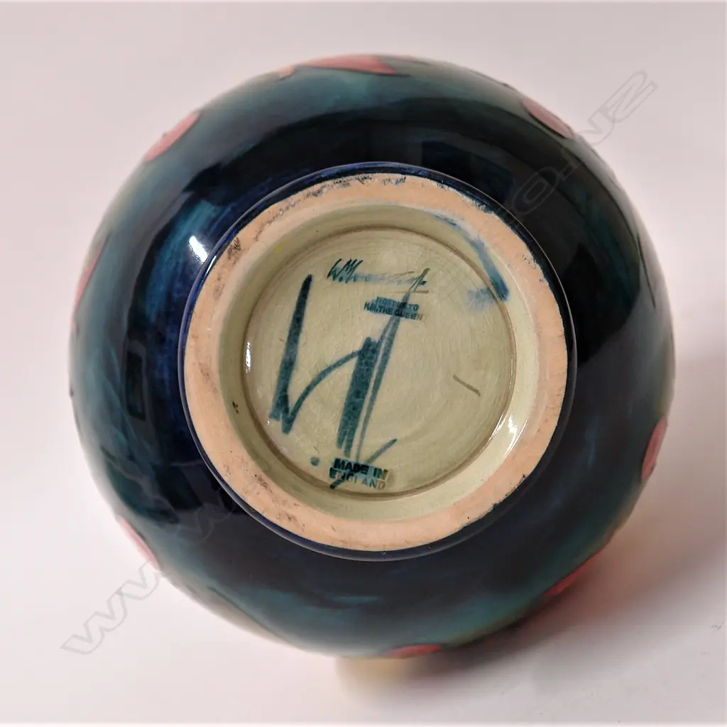 A Moorcroft ‘Leaf and Berry’ pattern vase Image 1++