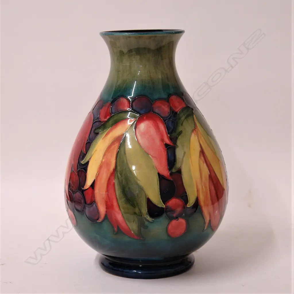 A Moorcroft ‘Leaf and Berry’ pattern vase Image 1++