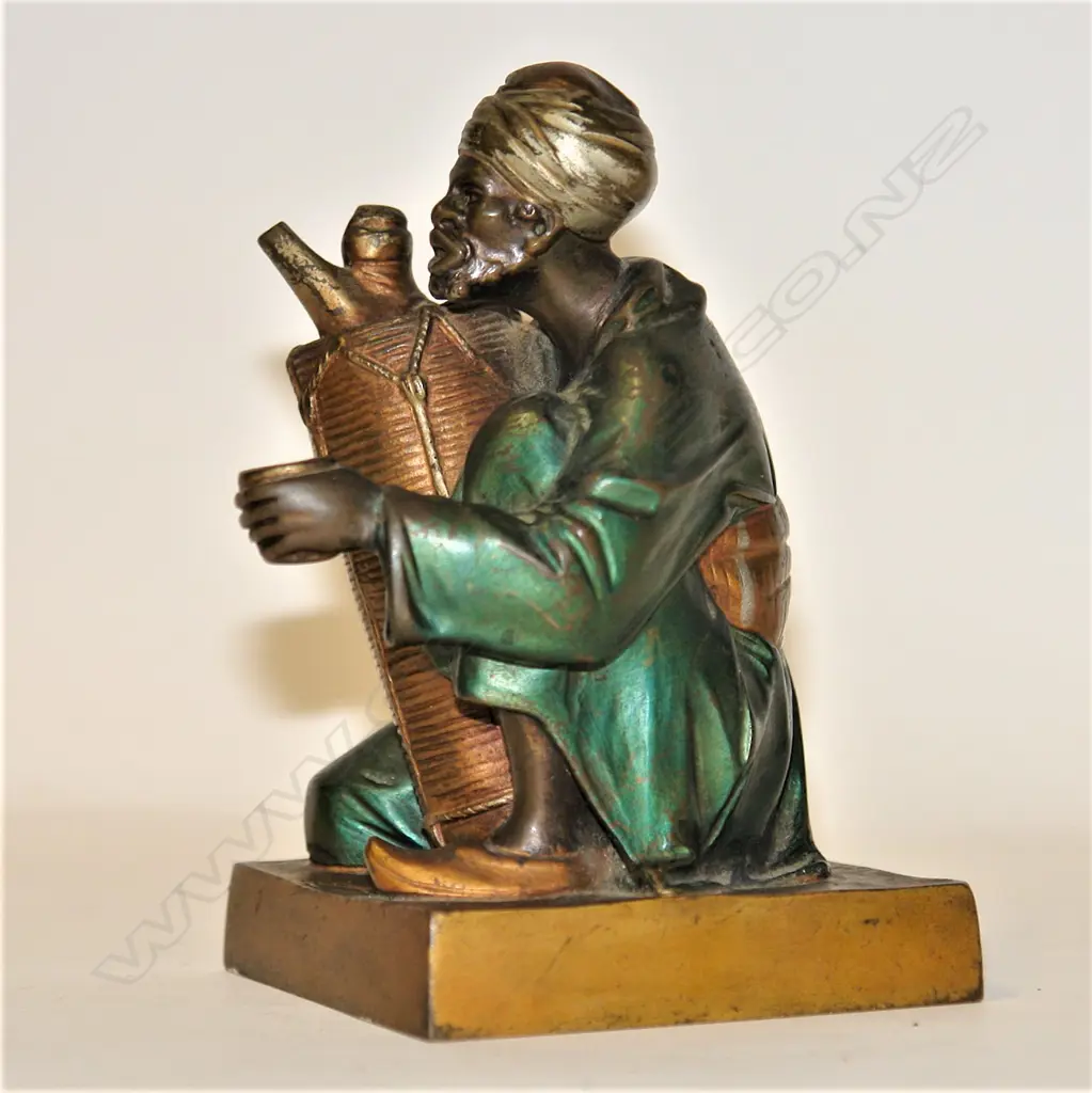 An Orientalist Art Deco cold painted bronze figure of an Arab water seller by Bruno Zach (1891 - 1935) Image 1++