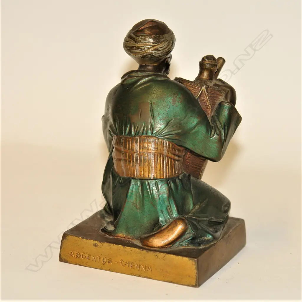 An Orientalist Art Deco cold painted bronze figure of an Arab water seller by Bruno Zach (1891 - 1935) Image 1++