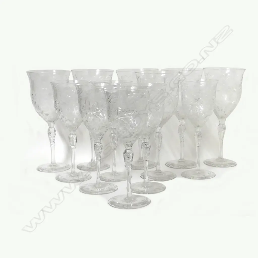 A set of twelve long stemmed crystal wine glasses Image 1++