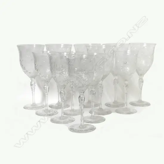 A set of twelve long stemmed crystal wine glasses