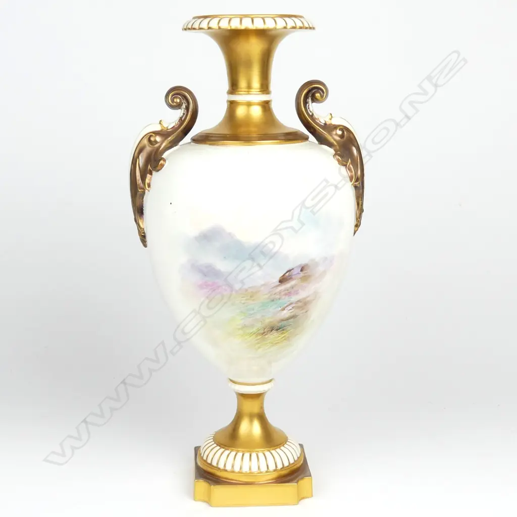 A large Royal Worcester two handled vase Image 1++