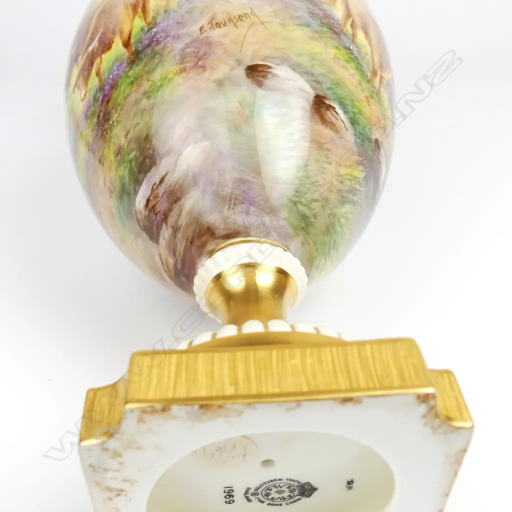 A large Royal Worcester two handled vase Image 1++