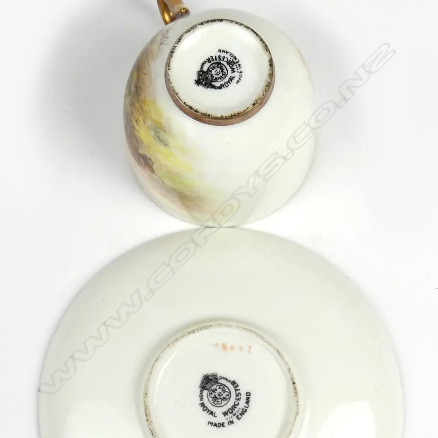 A Royal Worcester miniature cabinet cup and saucer Image 1++