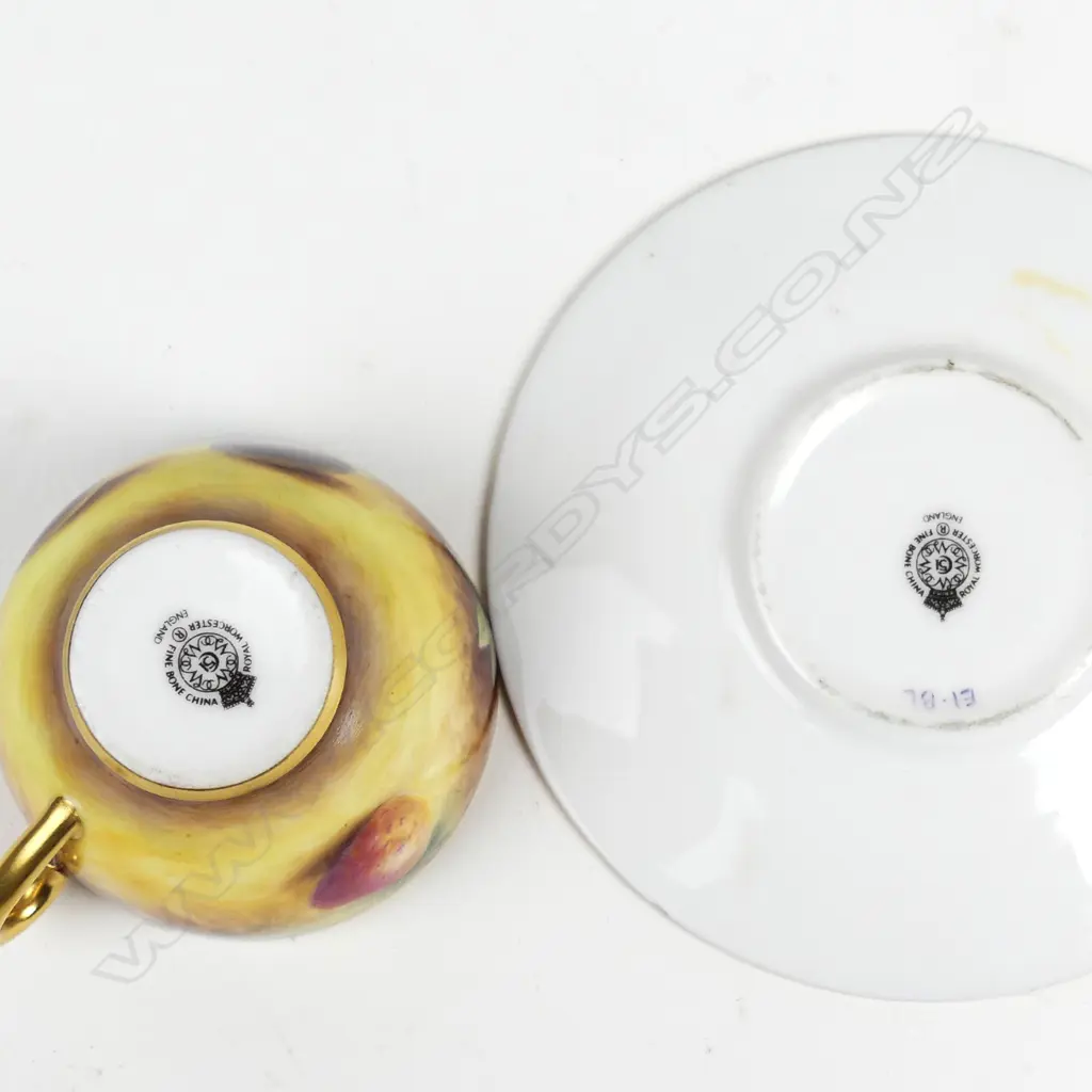 A Royal Worcester miniature cabinet cup and saucer Image 1++