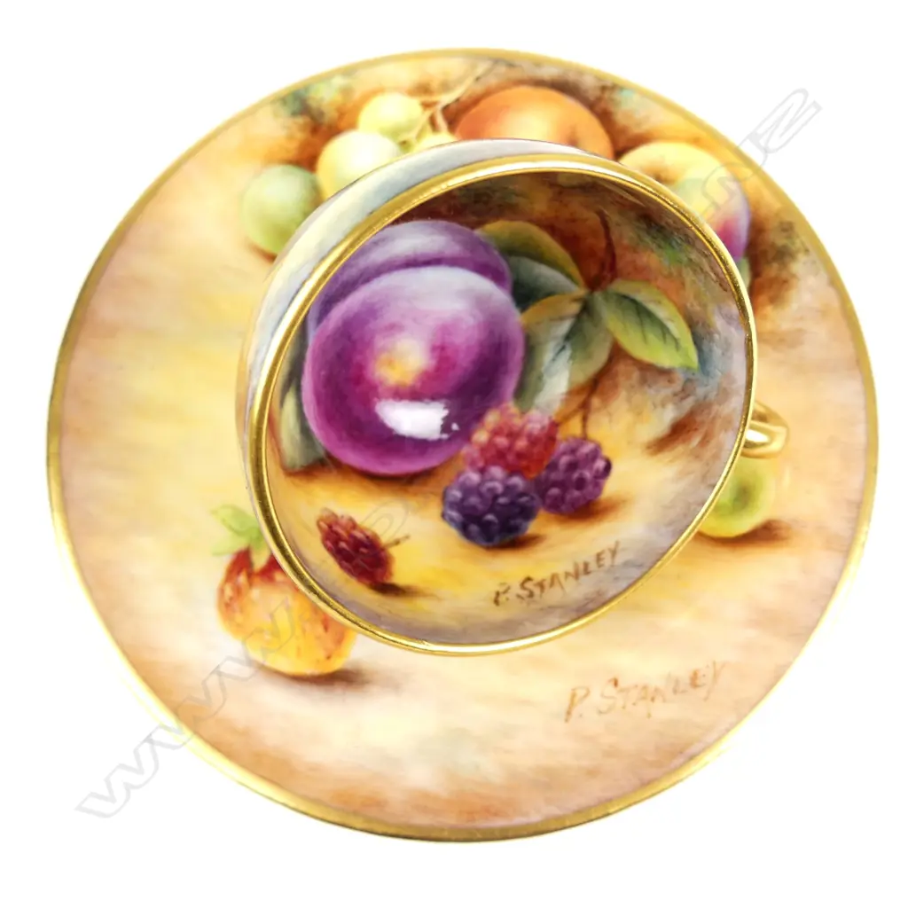 A Royal Worcester miniature cabinet cup and saucer Image 1++