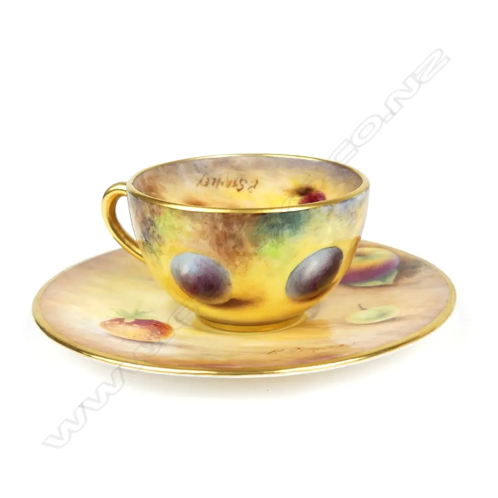 A Royal Worcester miniature cabinet cup and saucer Image 1++