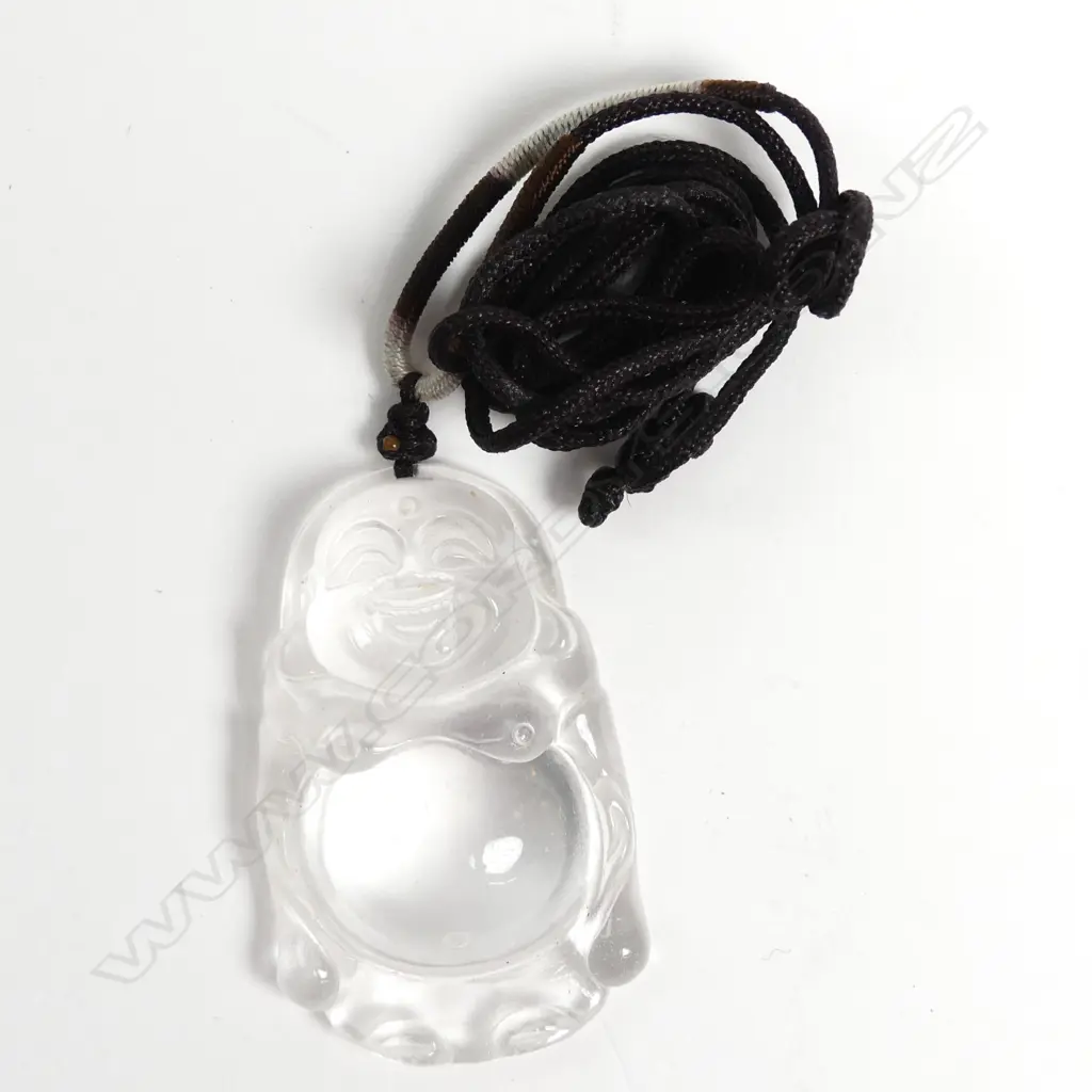 A Chinese carved rock crystal Buddha figured pendant Image 1++