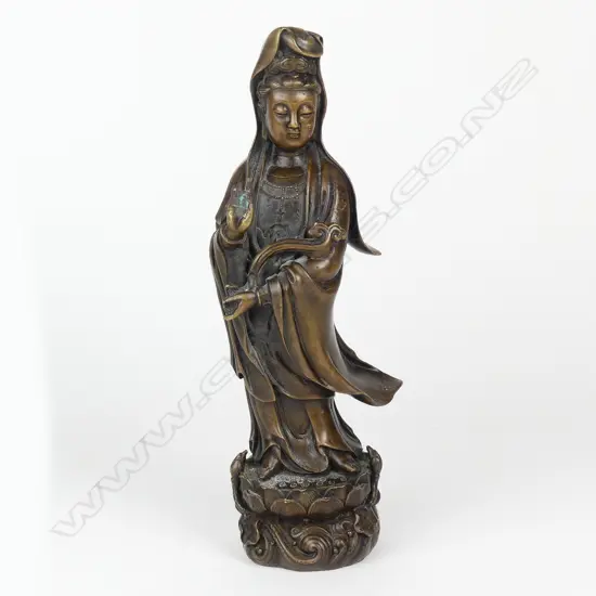 A heavy bronze figure of Guanyin