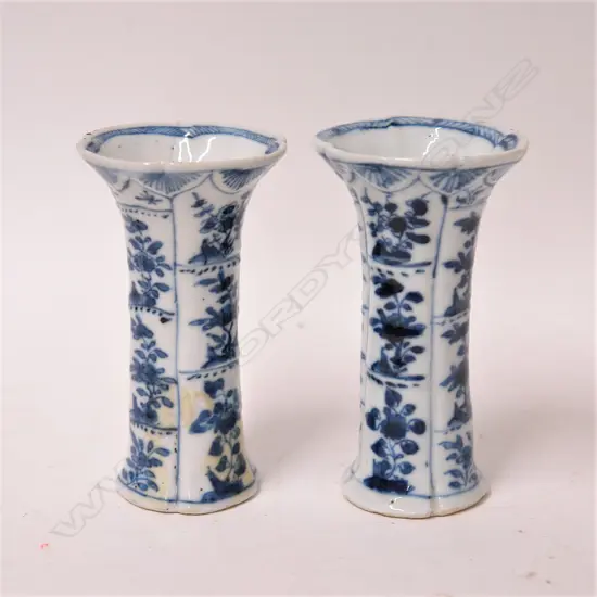 A pair of 19thC or earlier Chinese blue and white porcelain vases