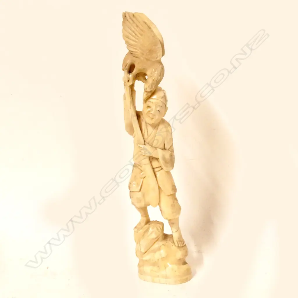 A Japanese carved marine ivory figure Image 1++