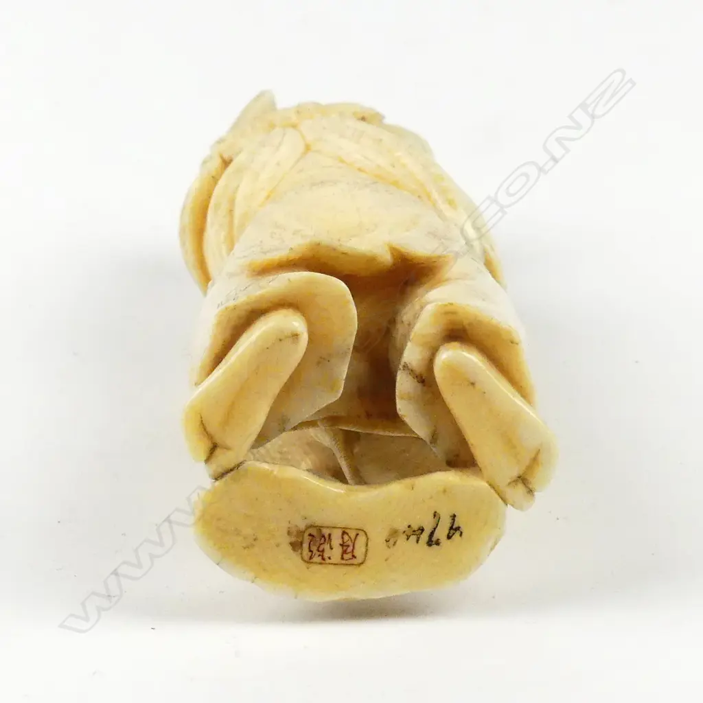 A Japanese ivory okimono Image 1++