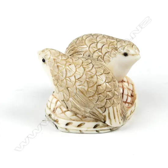 A Japanese carved ivory netsuke