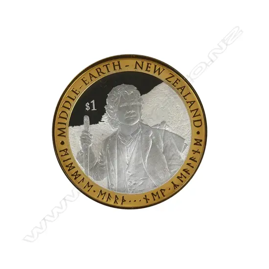 A 2012 NZ 1 ounce silver and gold plate Hobbit proof coin