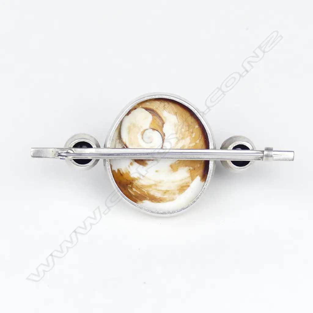 A silver and cats eye brooch Image 1++