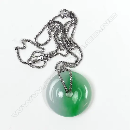 A variegated jade pendant