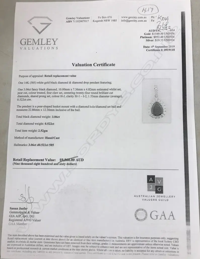 A 14ct white gold and diamond pendant Image 1++