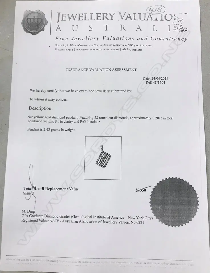 A 9ct gold and diamond pendant Image 1++