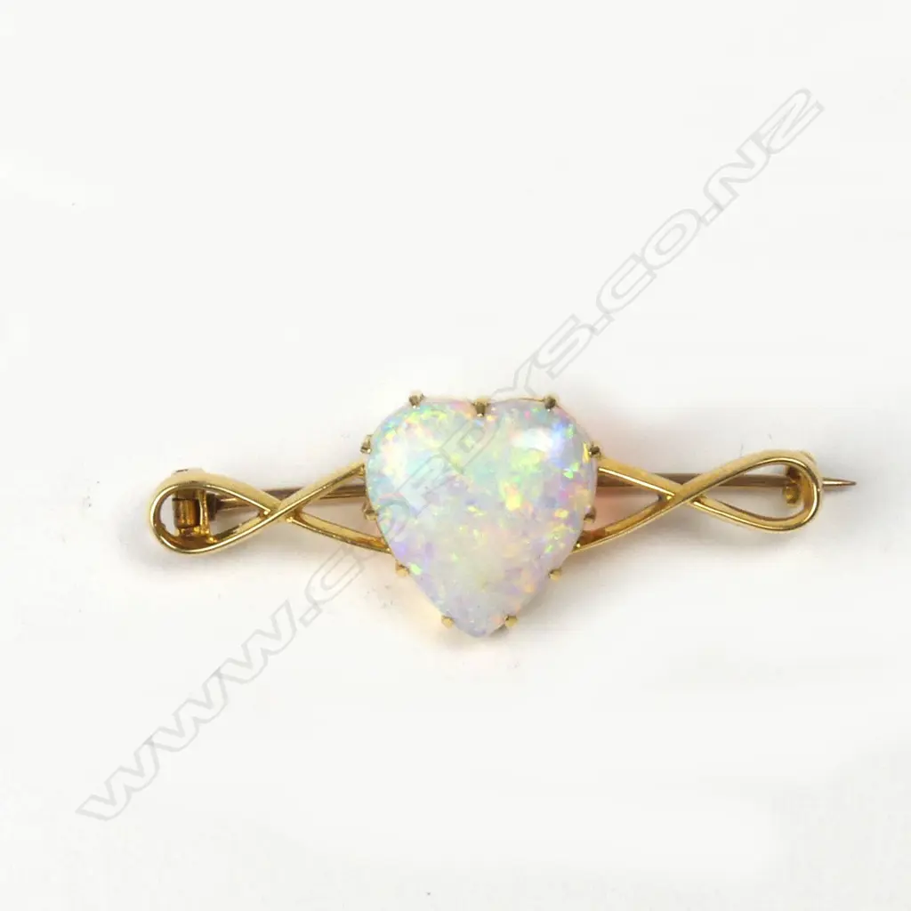 An Edwardian 18ct. yellow gold and large opal brooch Image 1++