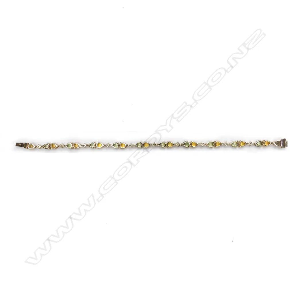 A 14ct gold sapphire and diamond bracelet Image 1++