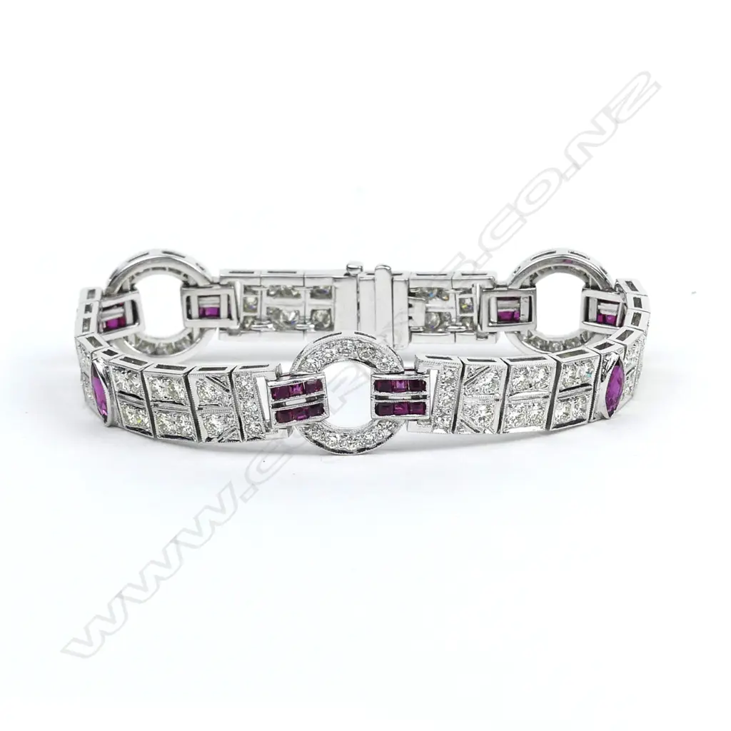 An 18ct white gold diamond and ruby bracelet Image 1++