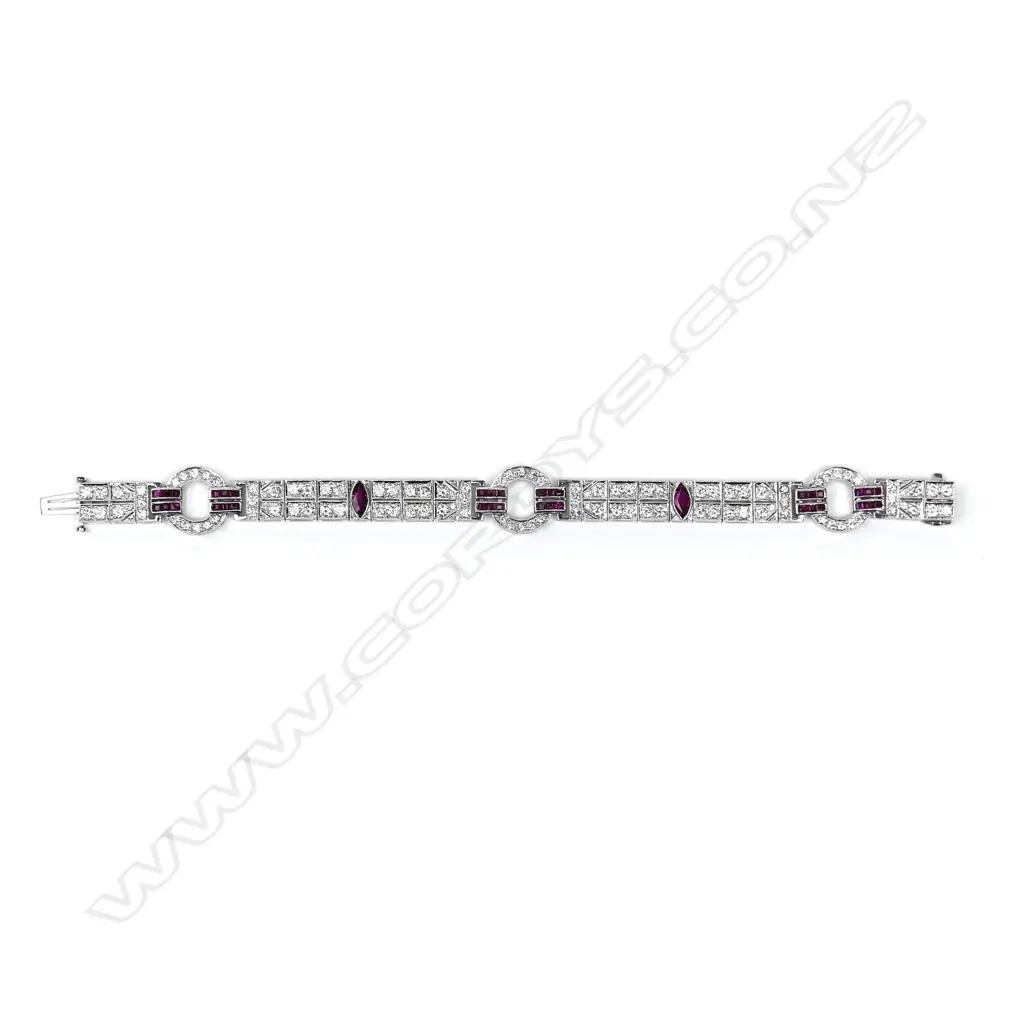 An 18ct white gold diamond and ruby bracelet Image 1++