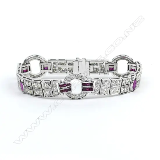 An 18ct white gold diamond and ruby bracelet