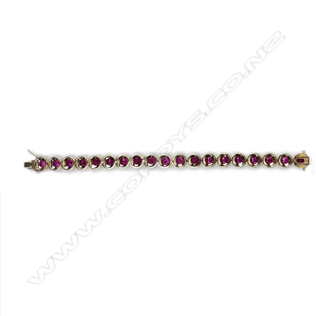 A 14ct gold ruby and diamond bracelet Image 1++