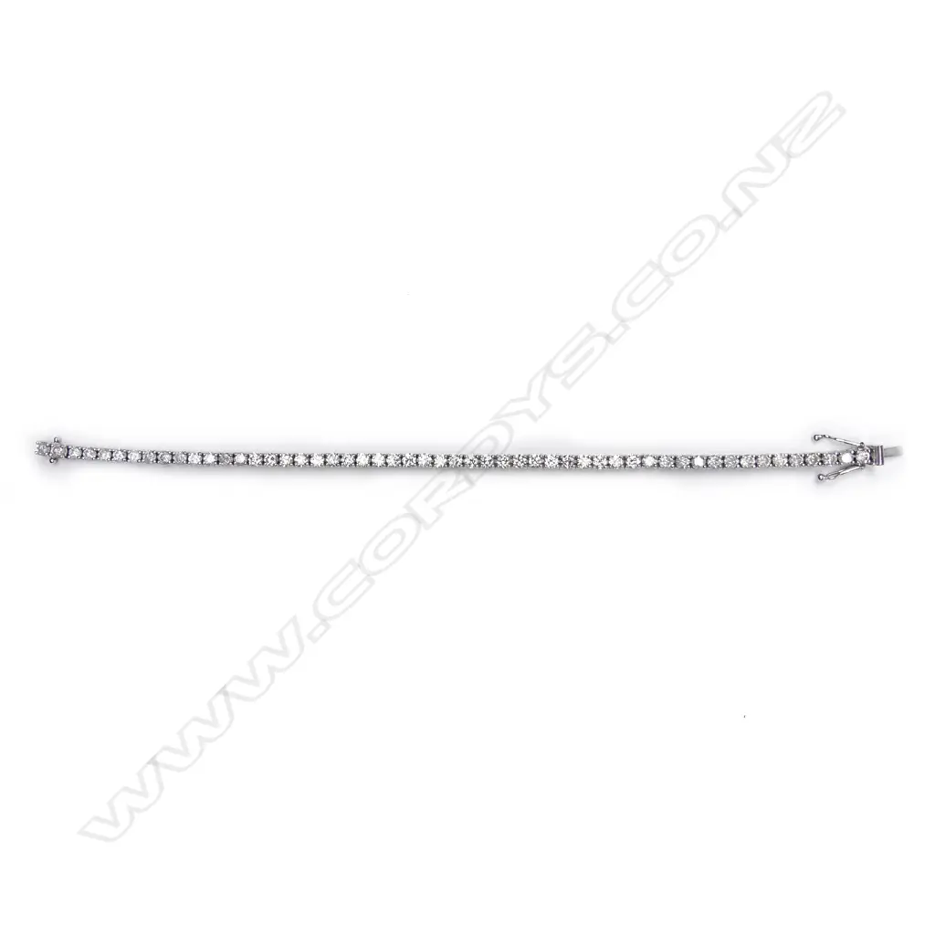 A 14ct white gold and diamond tennis bracelet Image 1++