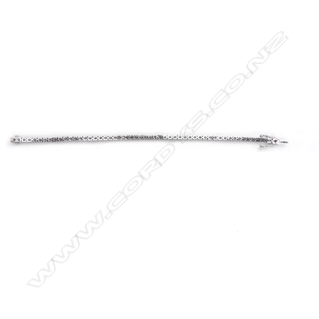A 14ct white gold and diamond tennis bracelet Image 1++