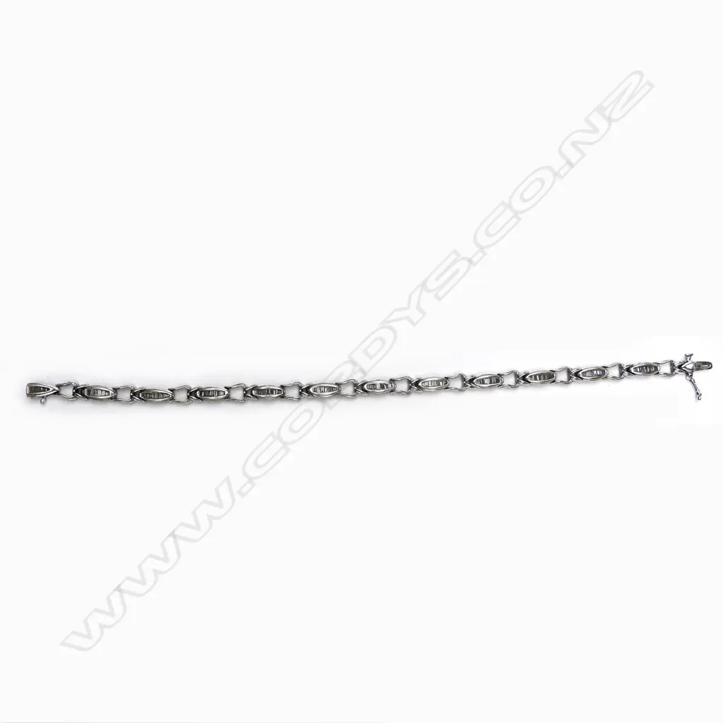 An 18ct white gold and diamond tennis bracelet Image 1++