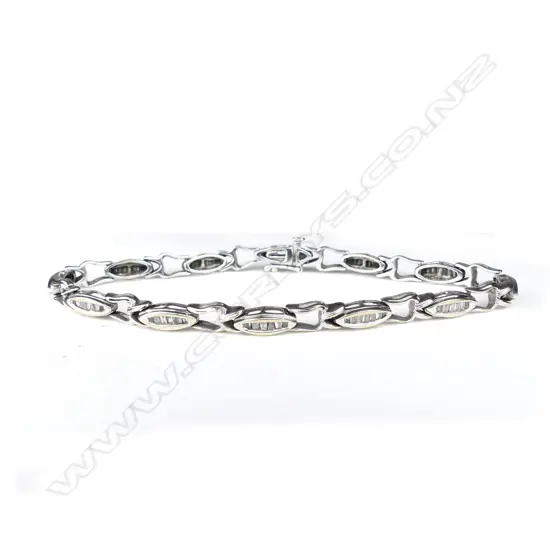 An 18ct white gold and diamond tennis bracelet