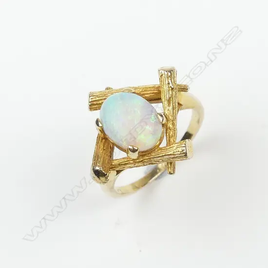A retro 14ct gold and opal ring