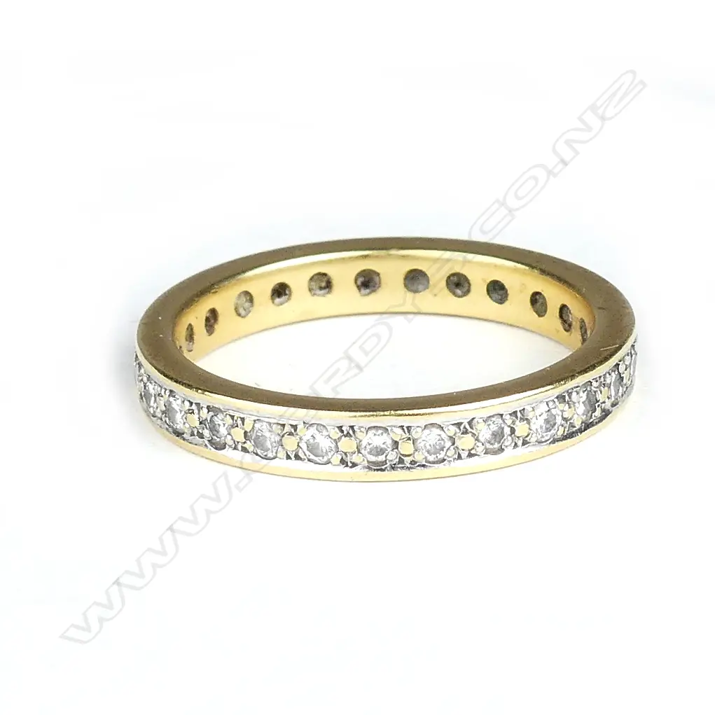 An 18ct gold and diamond eternity ring Image 1++