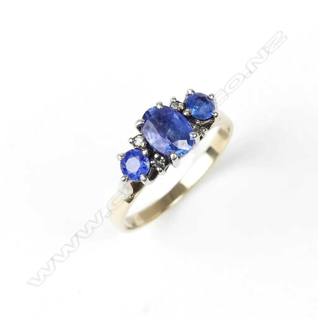 A 9ct gold sapphire and diamond ring Image 1++