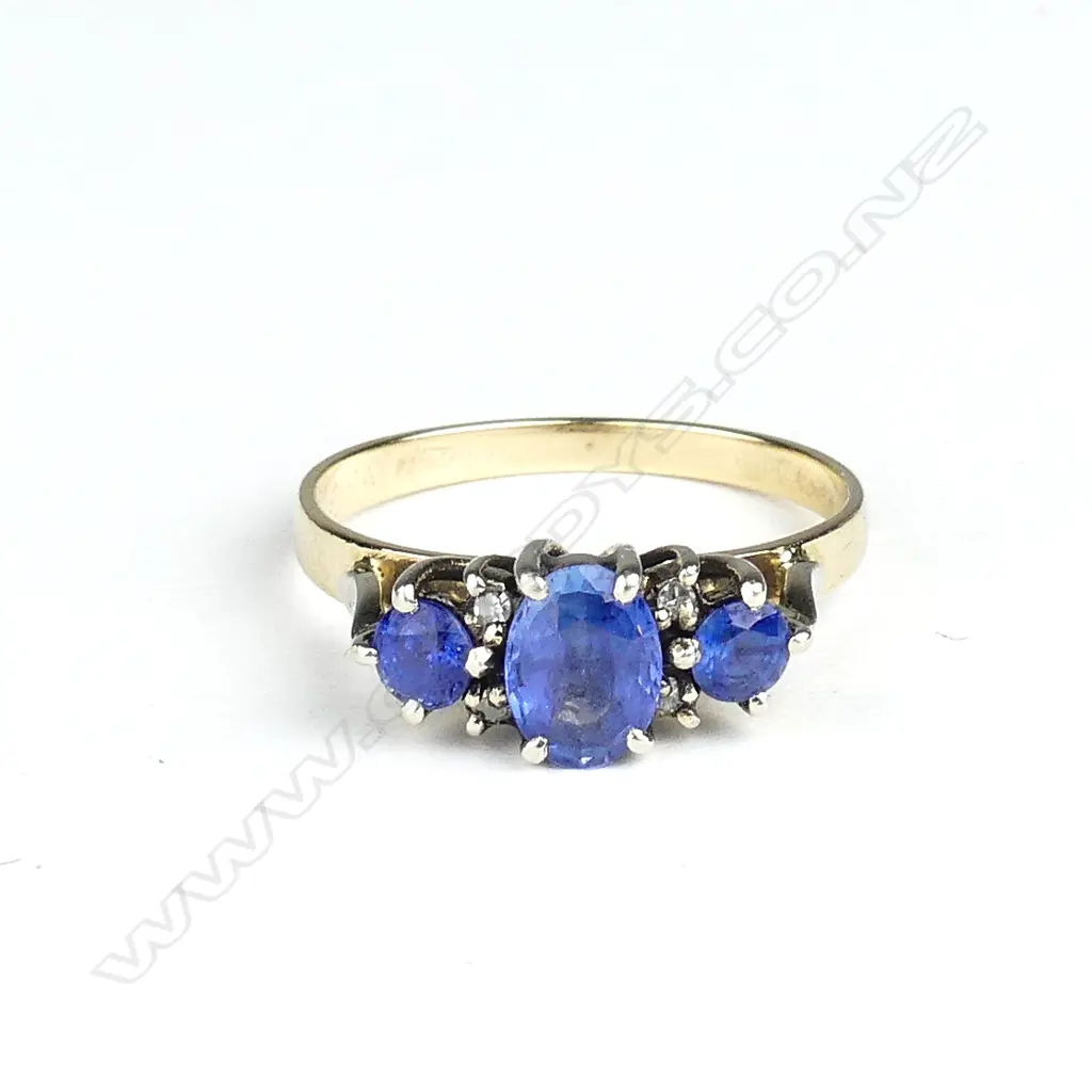 A 9ct gold sapphire and diamond ring Image 1++