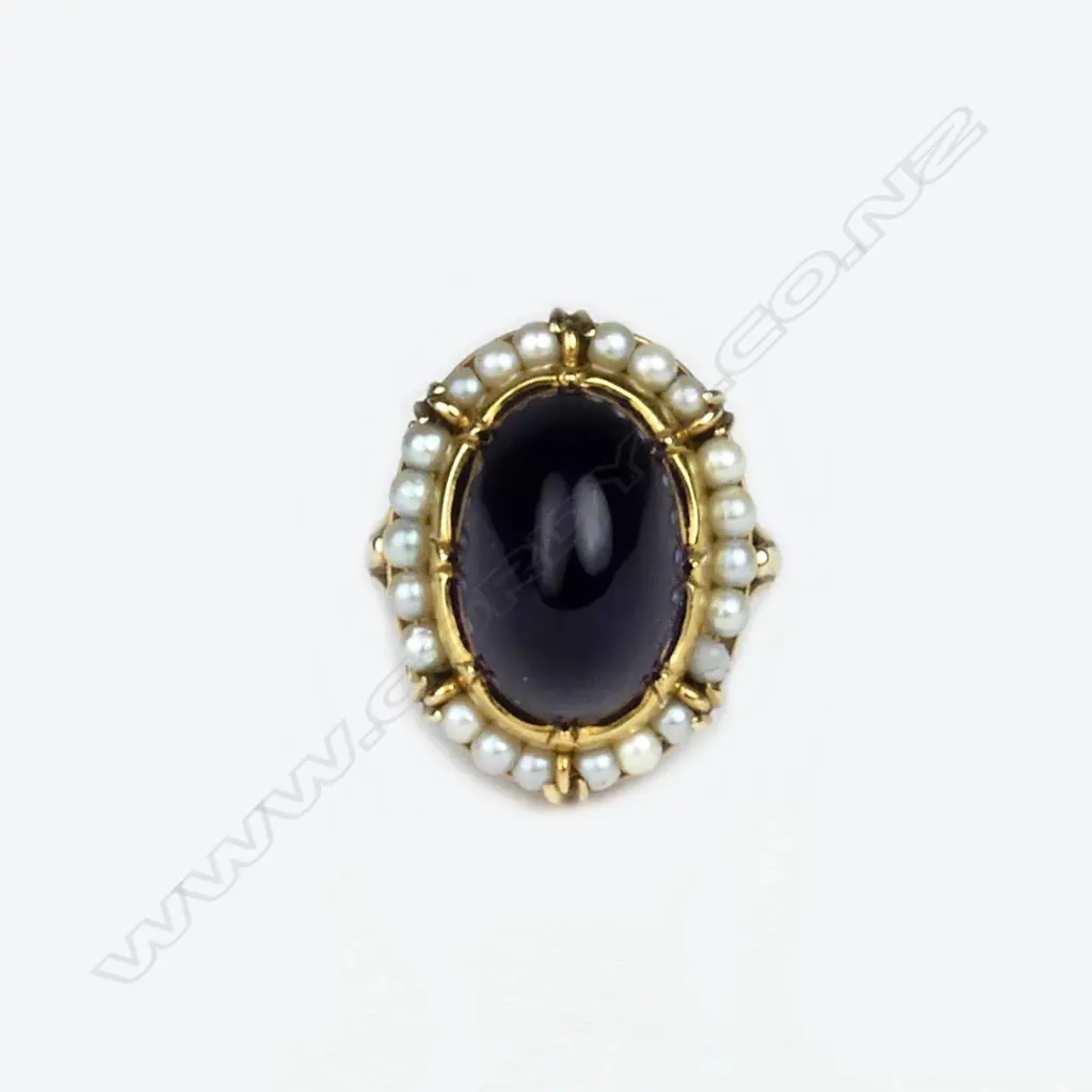 A 14ct. gold amethyst and pearl dress ring Image 1++