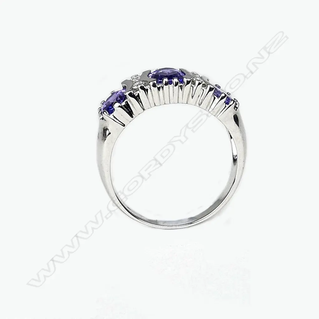 A 14ct white gold tanzanite and diamond ring Image 1++