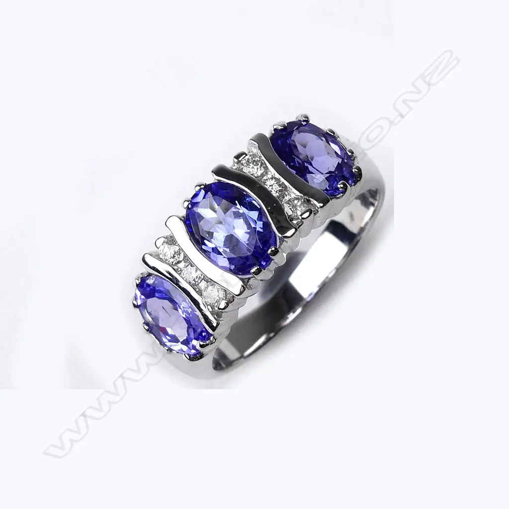 A 14ct white gold tanzanite and diamond ring Image 1++