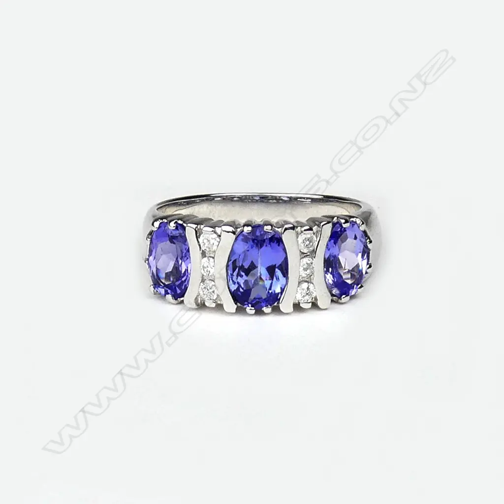 A 14ct white gold tanzanite and diamond ring Image 1++