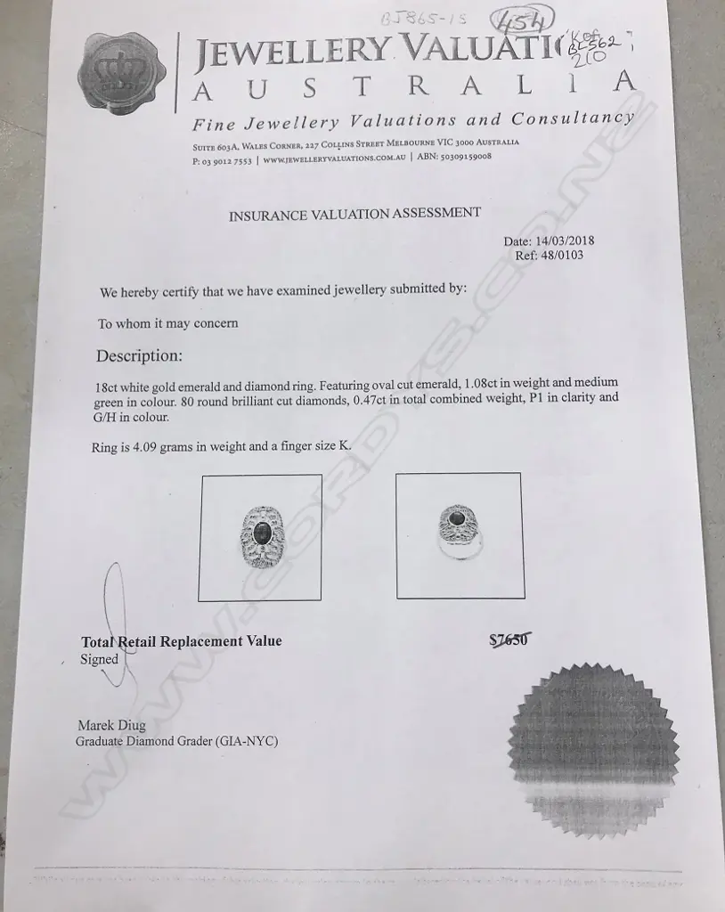 An 18ct. white gold emerald and diamond Art Deco style ring Image 1++