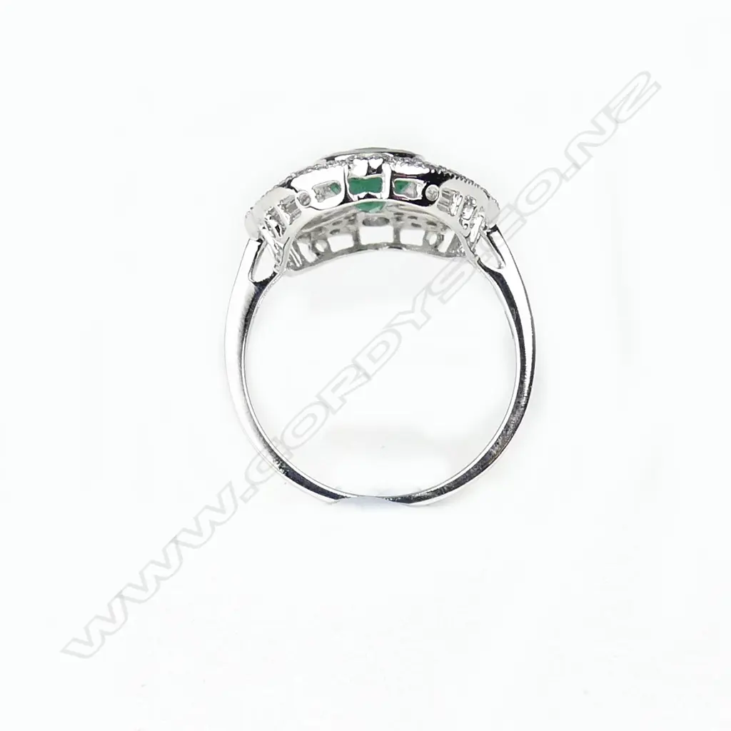 An 18ct. white gold emerald and diamond Art Deco style ring Image 1++