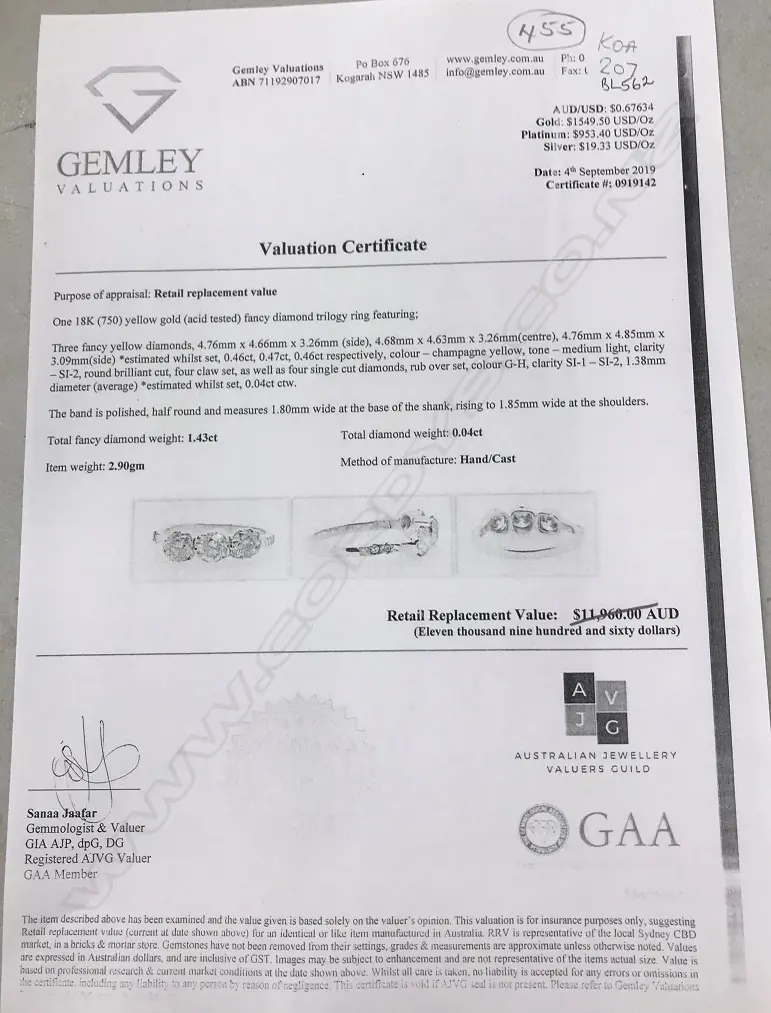 An 18ct gold and diamond trilogy ring Image 1++