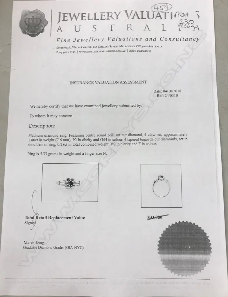 A platinum and diamond solitaire ring Image 1++
