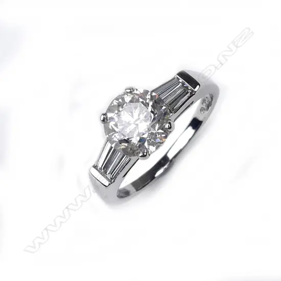 A platinum and diamond solitaire ring