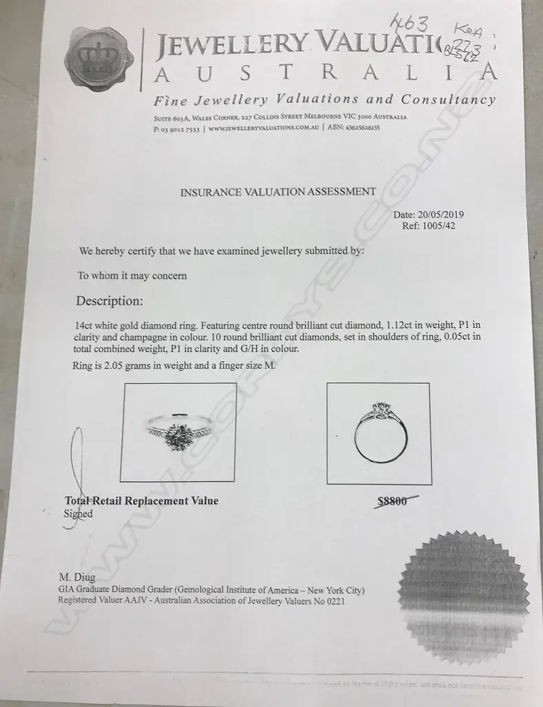 A 14ct white gold and diamond solitaire ring Image 1++